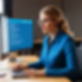 A teacher using classroom control software on a computer.